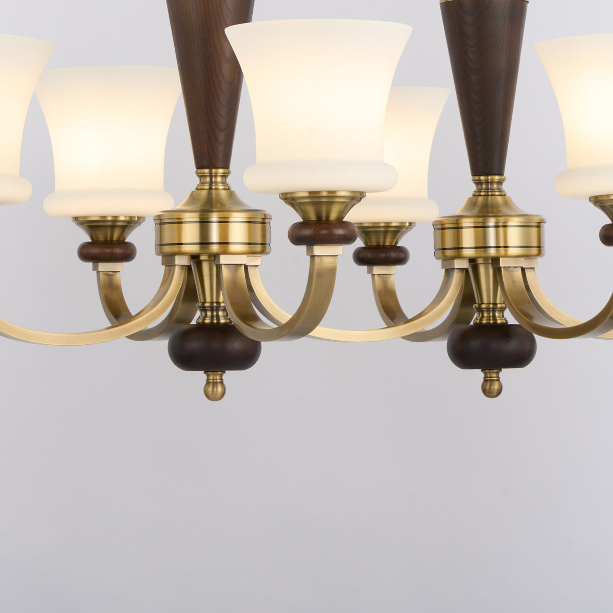 Caldrienne linear chandelier copper arm and ash wood ring detail