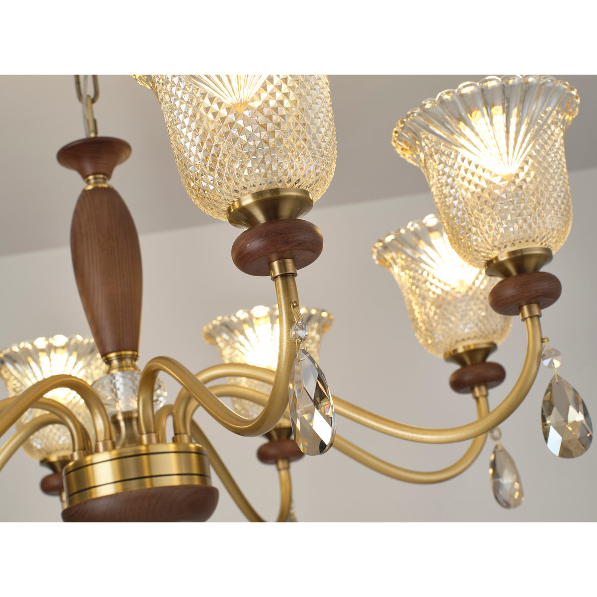 Cognelle chandelier illuminated glass and ash wood ring detail