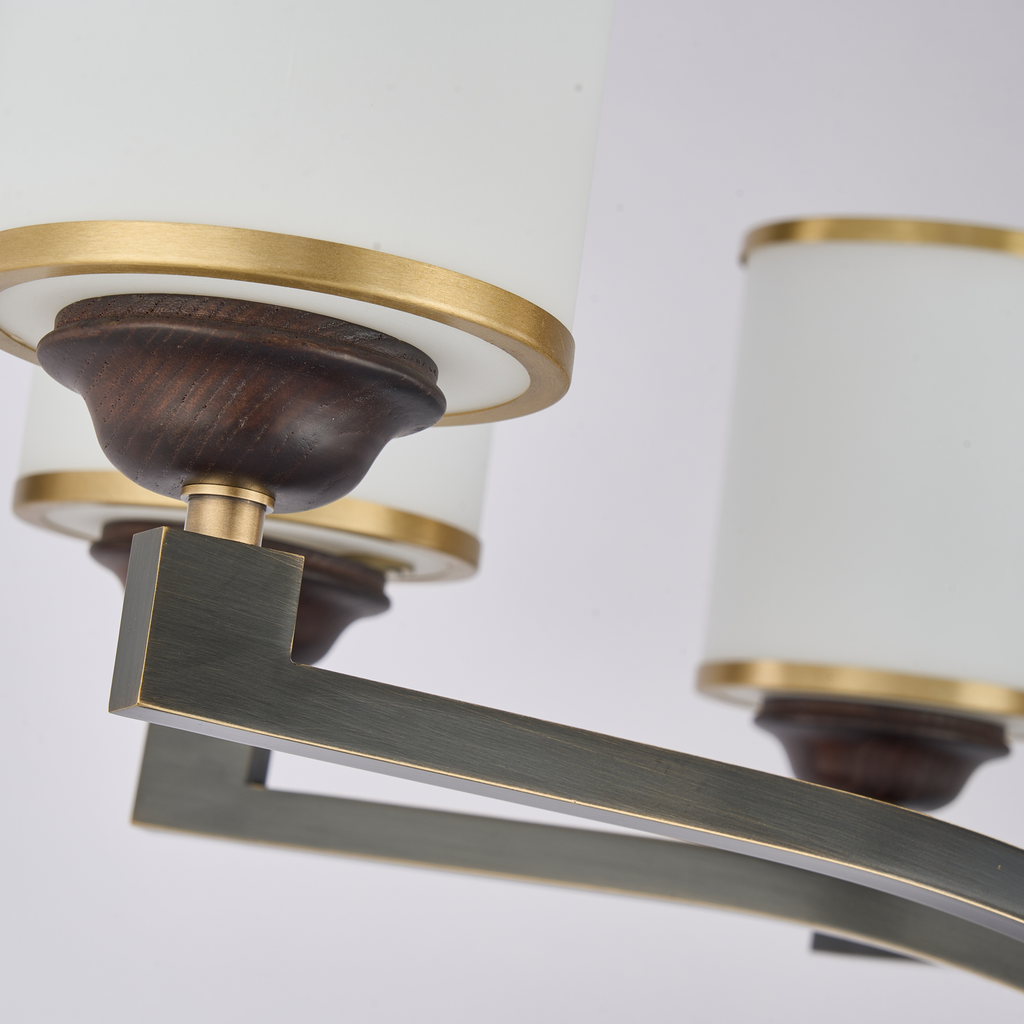 Cylmere opal-glass shade, ash-wood cup and blackened angular arm detail