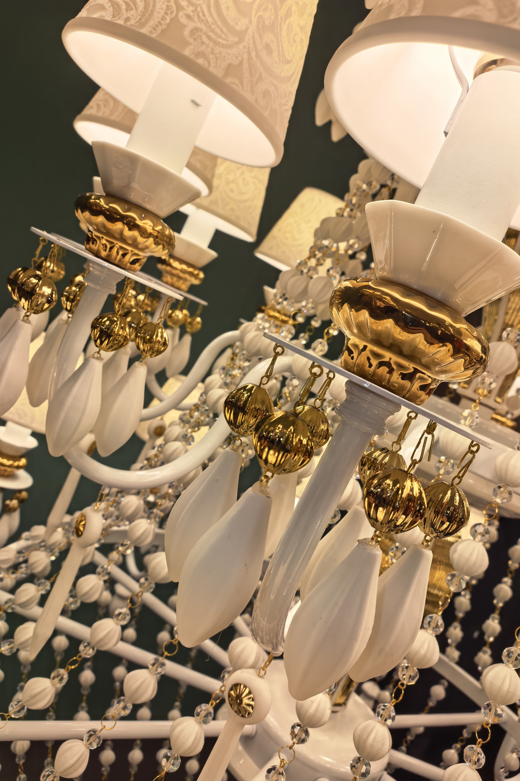 Ivorelle chandelier – gold-tone metal connection detail