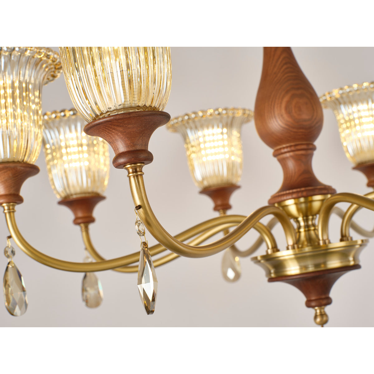 Real Rosalind chandelier detail showing the tall ash-wood spindle