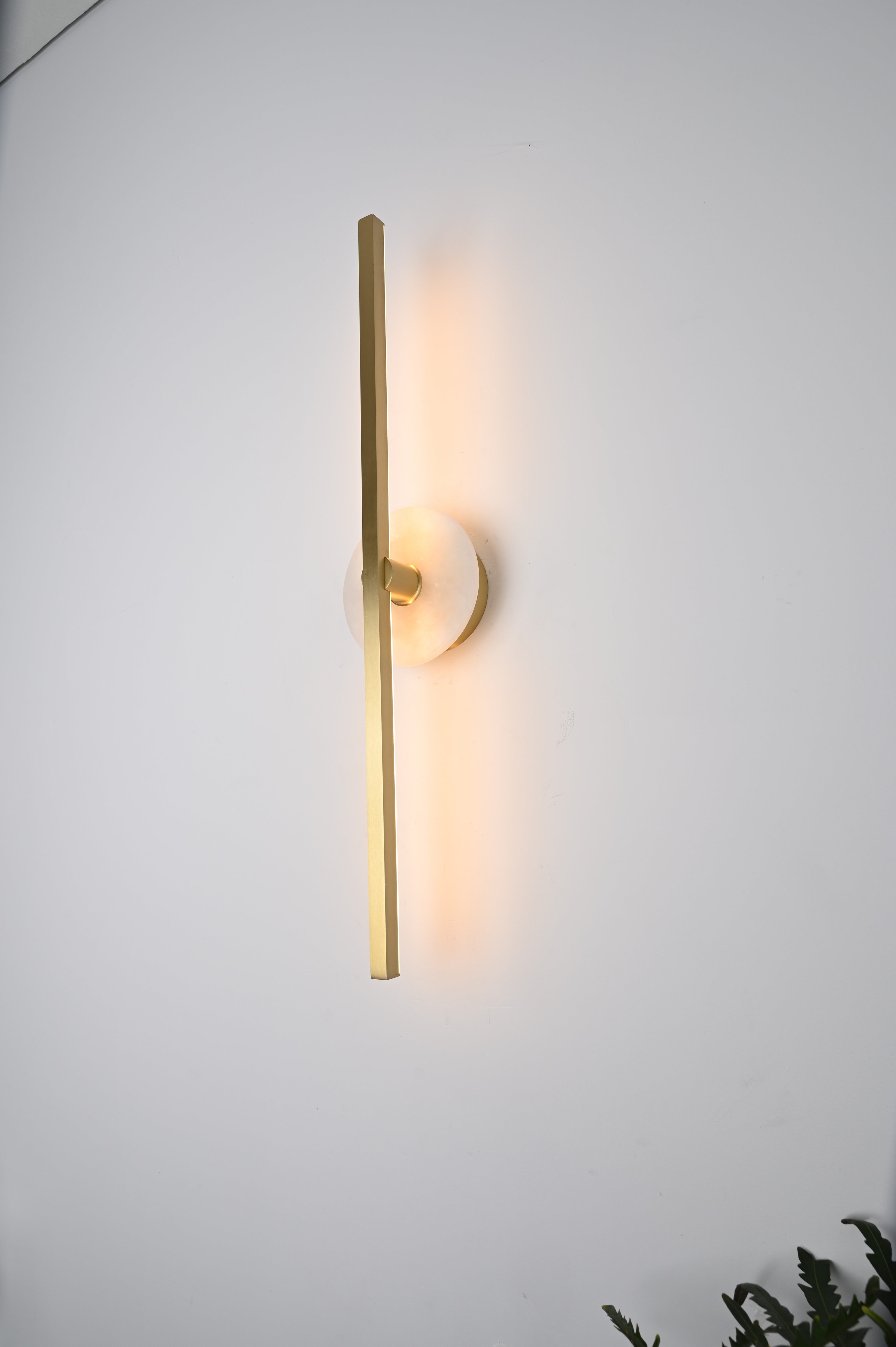 Modern Stone Disc Linear Wall Sconce in Natural Brass - 13 13-real-lit-portrait