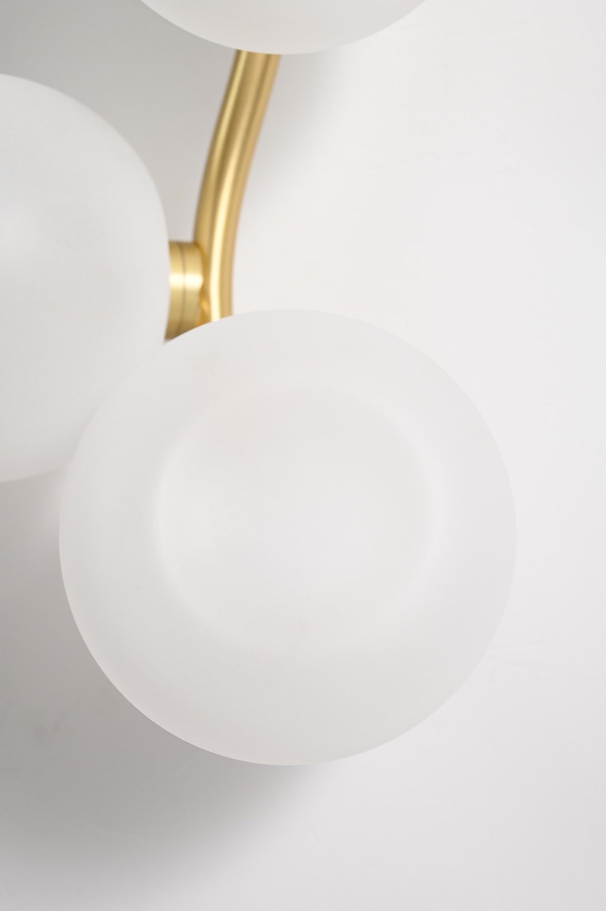 Modern Glass Globe Branch Wall Sconce in Natural Brass - 13 13-real-shot-glass-globe-wall-sconce-room-view