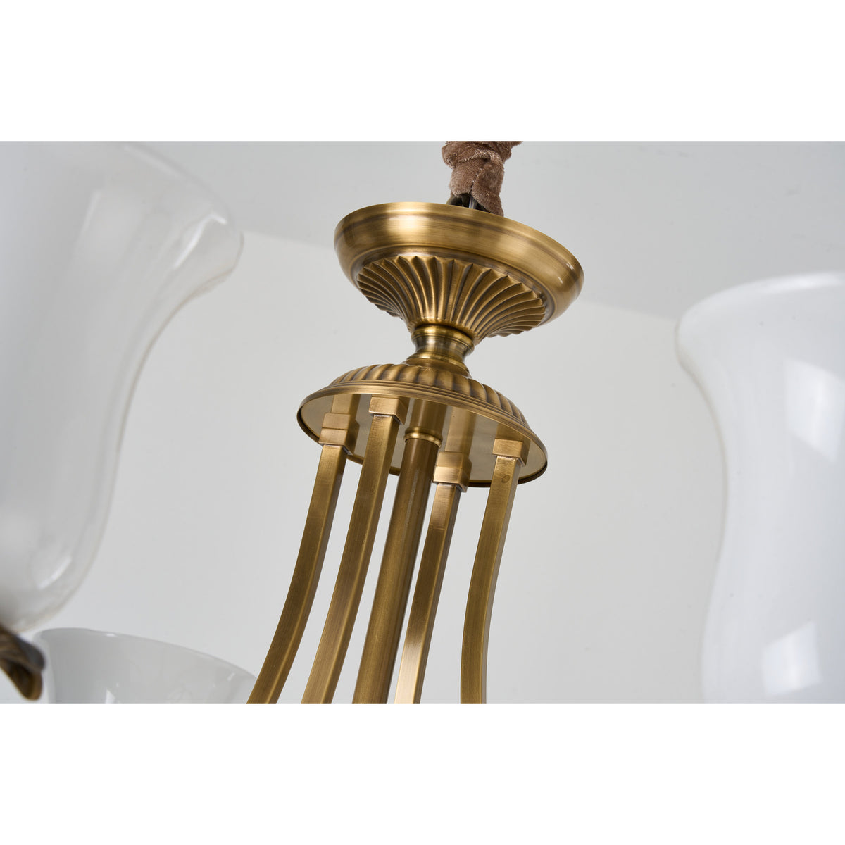 Real Marcelline chandelier detail showing the upper antique brass body