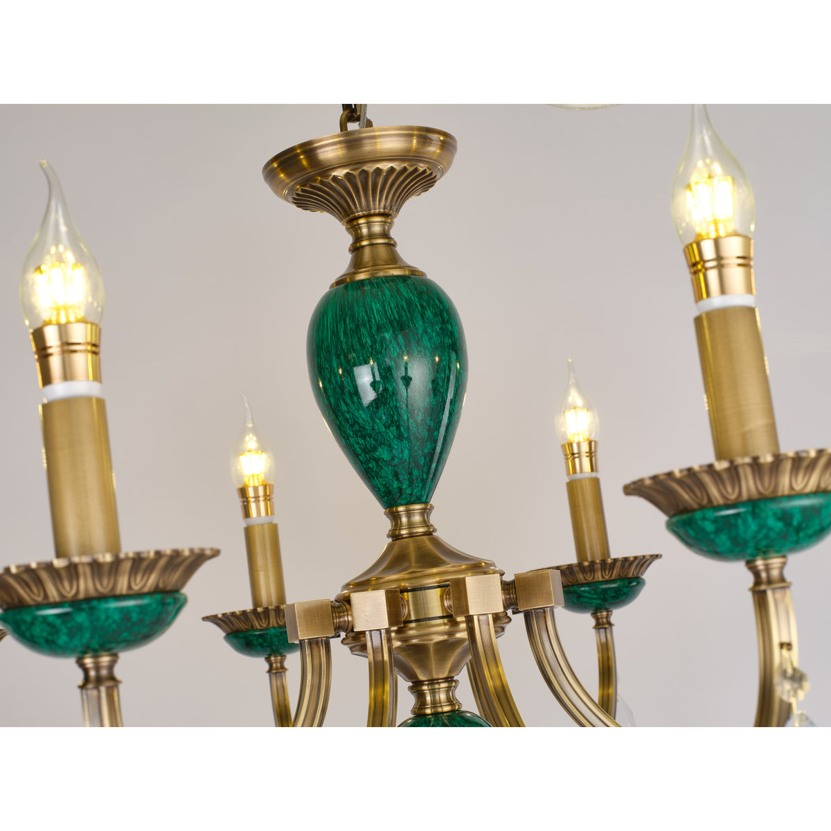 Real Valeria chandelier detail showing the malachite-pattern center