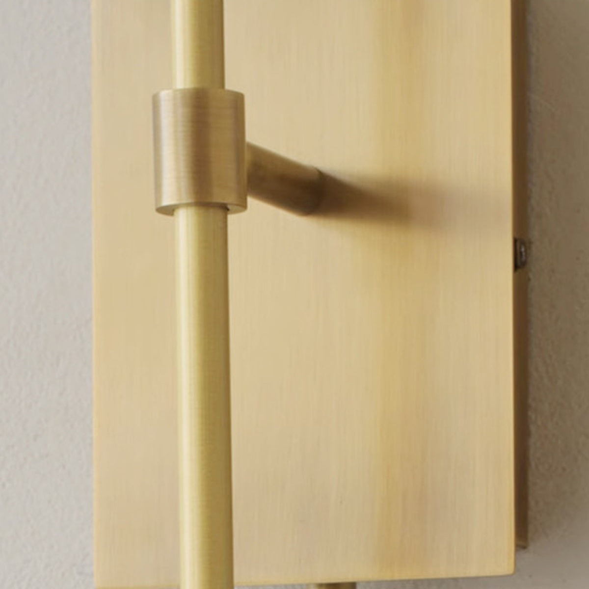 Double Loop Wall Sconce brass backplate detail