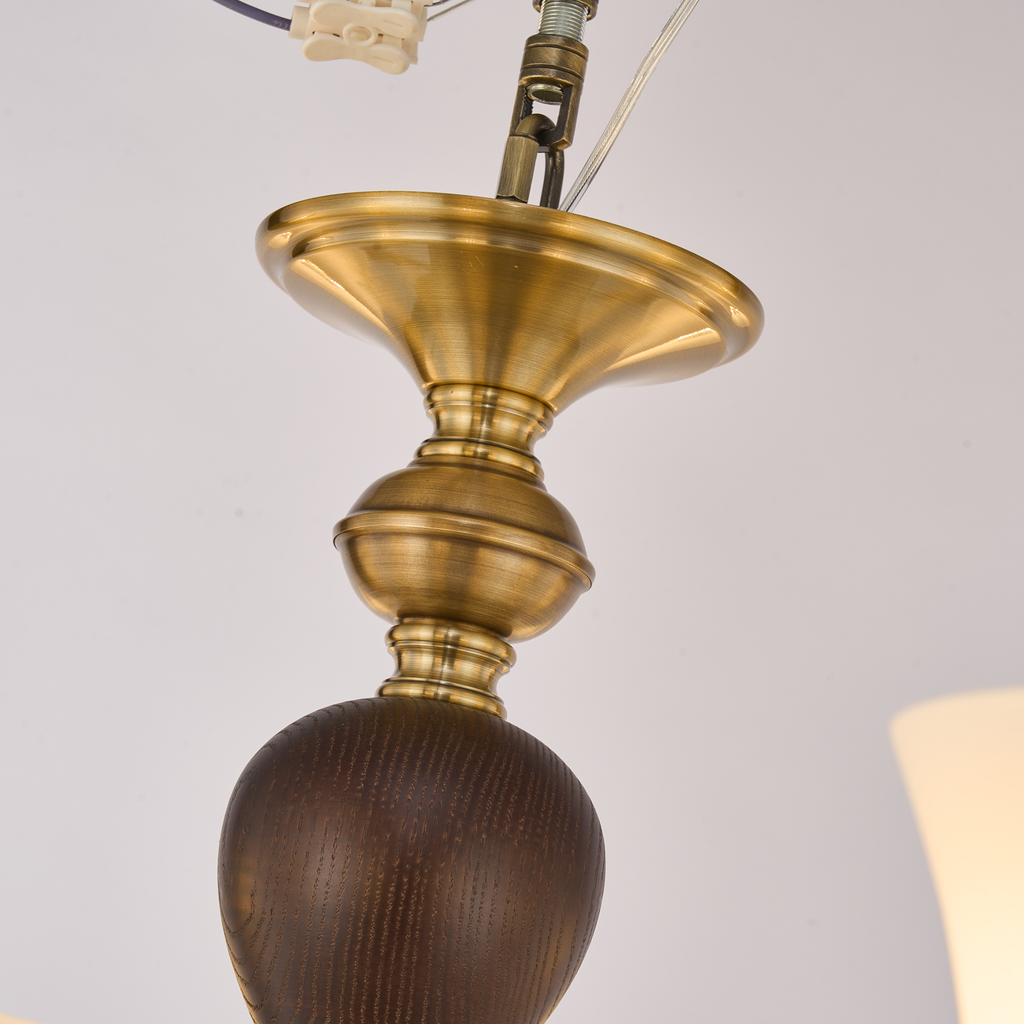 Halveraine natural-copper-finished upper fitting and dark ash-wood center stem detail