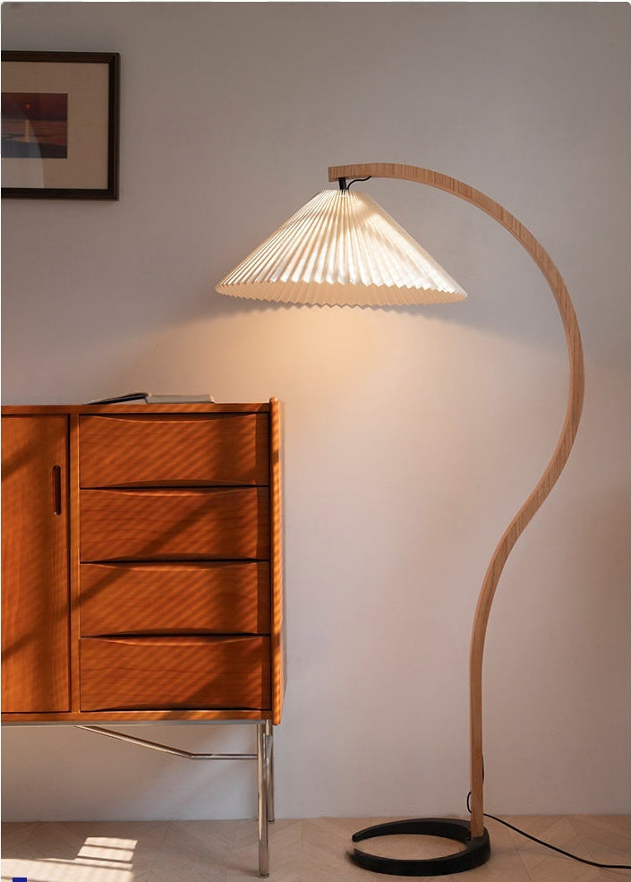 Sculptural Wood Floor Lamp — complete real floor lamp beside a wood cabinet