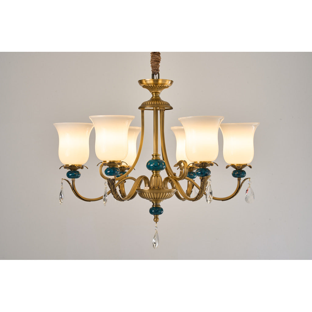 Marcelline six-light antique brass and teal glass chandelier on a white background