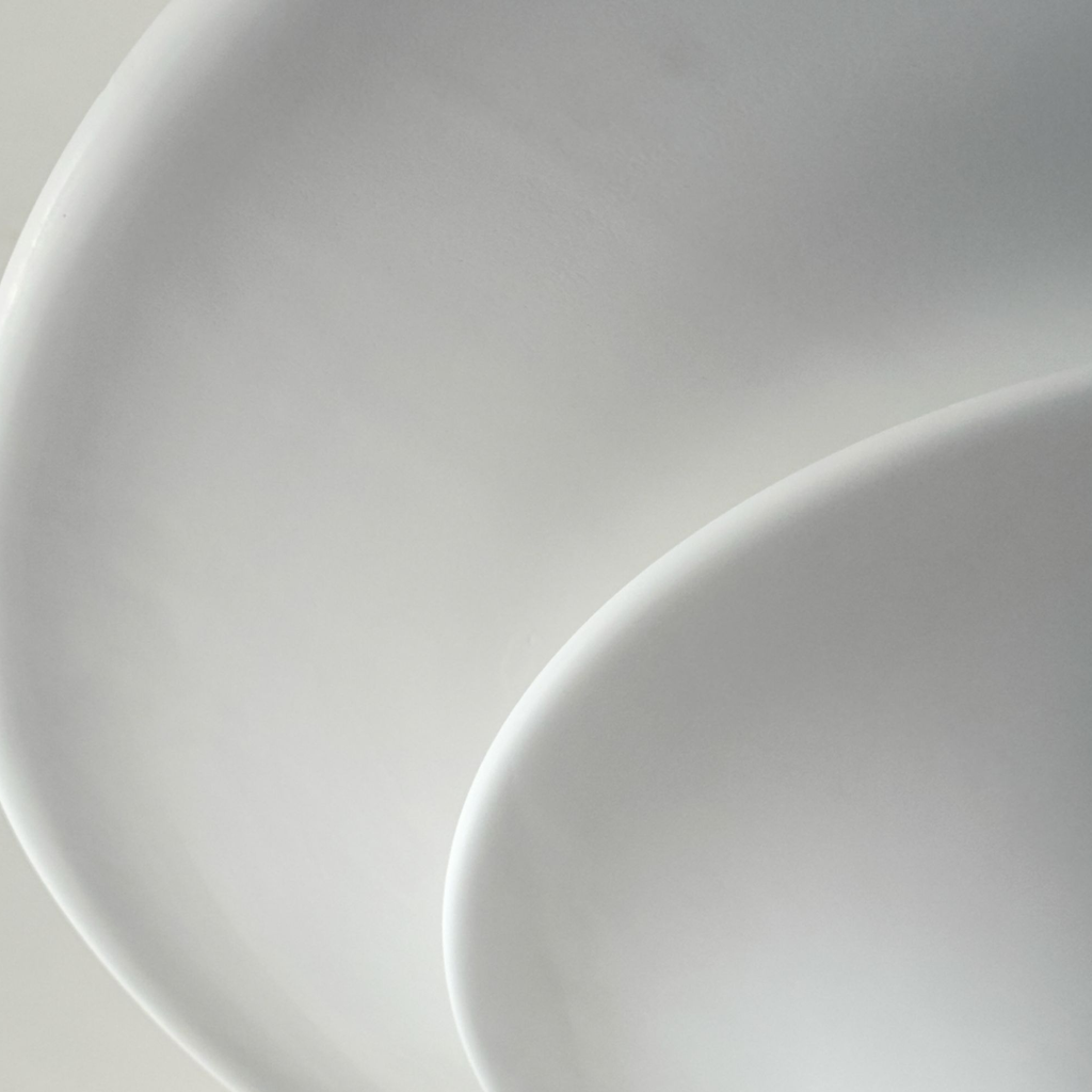 Sculptural Double-Tier Plaster Wall Sconce — real curved plaster shade detail