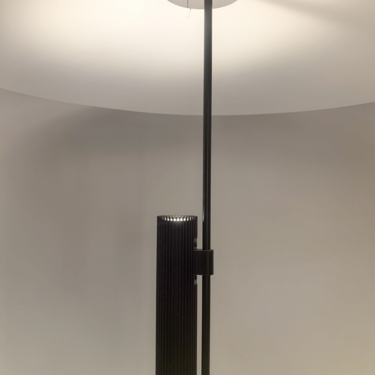Close supplier photograph of the matte-black integrated LED cylinder