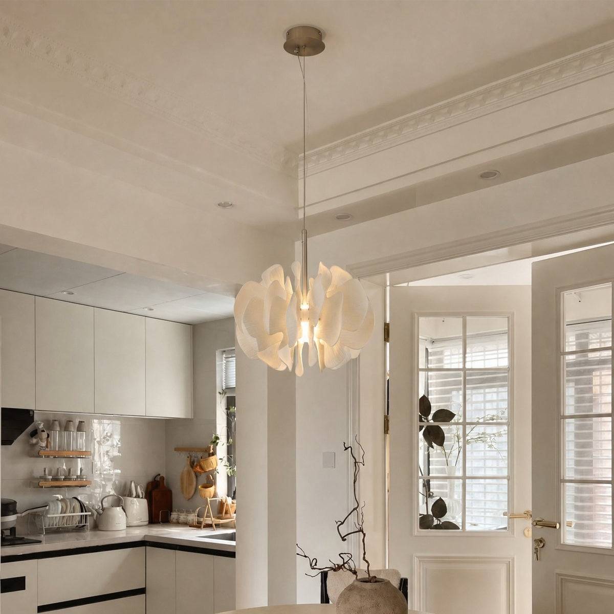 Sculptural Ivory Ceramic Petal Pendant real product view installed in a kitchen dining space