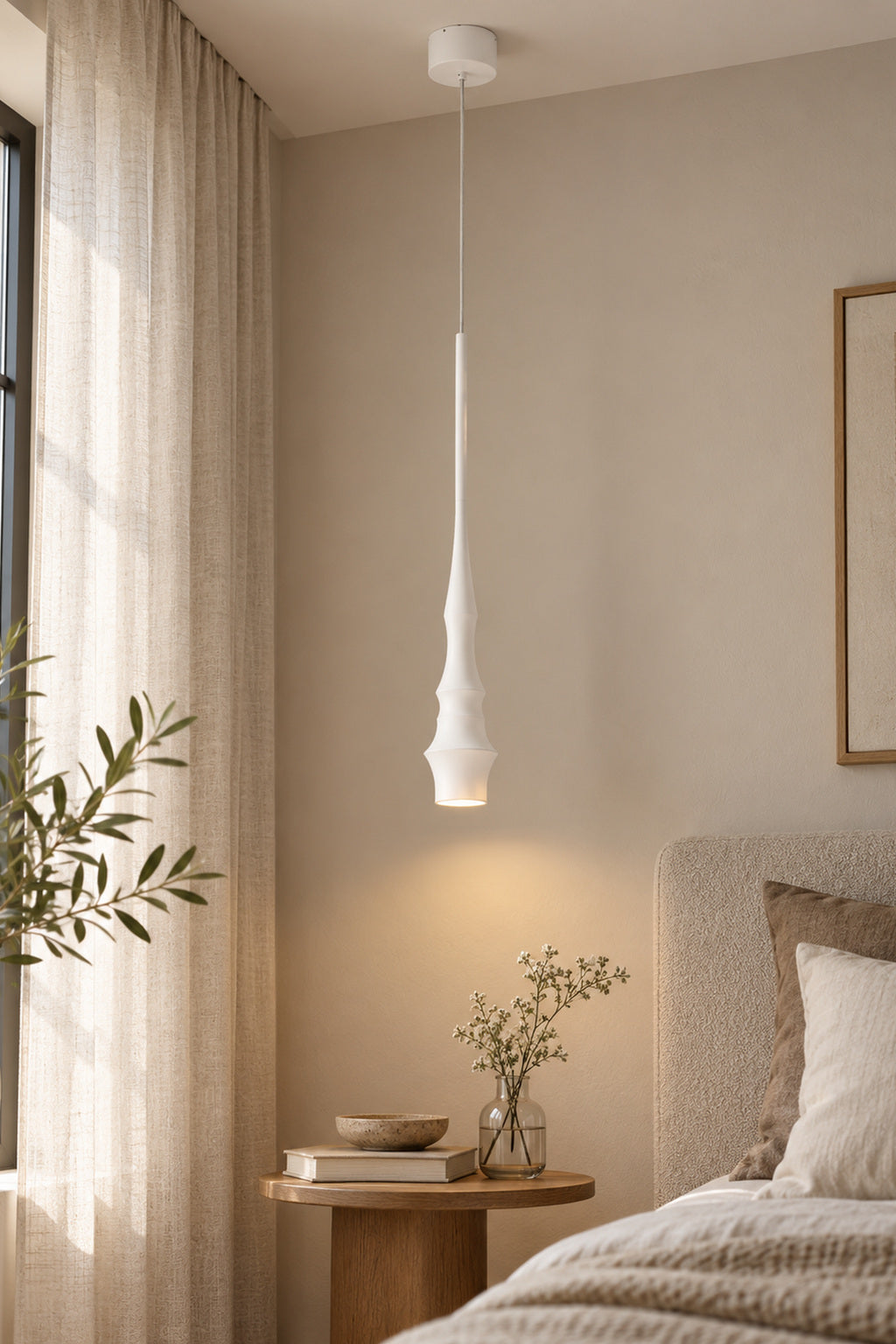 Torvelle Sculptural Pendant Light in a warm white bedside setting · CDE 2026-09-25