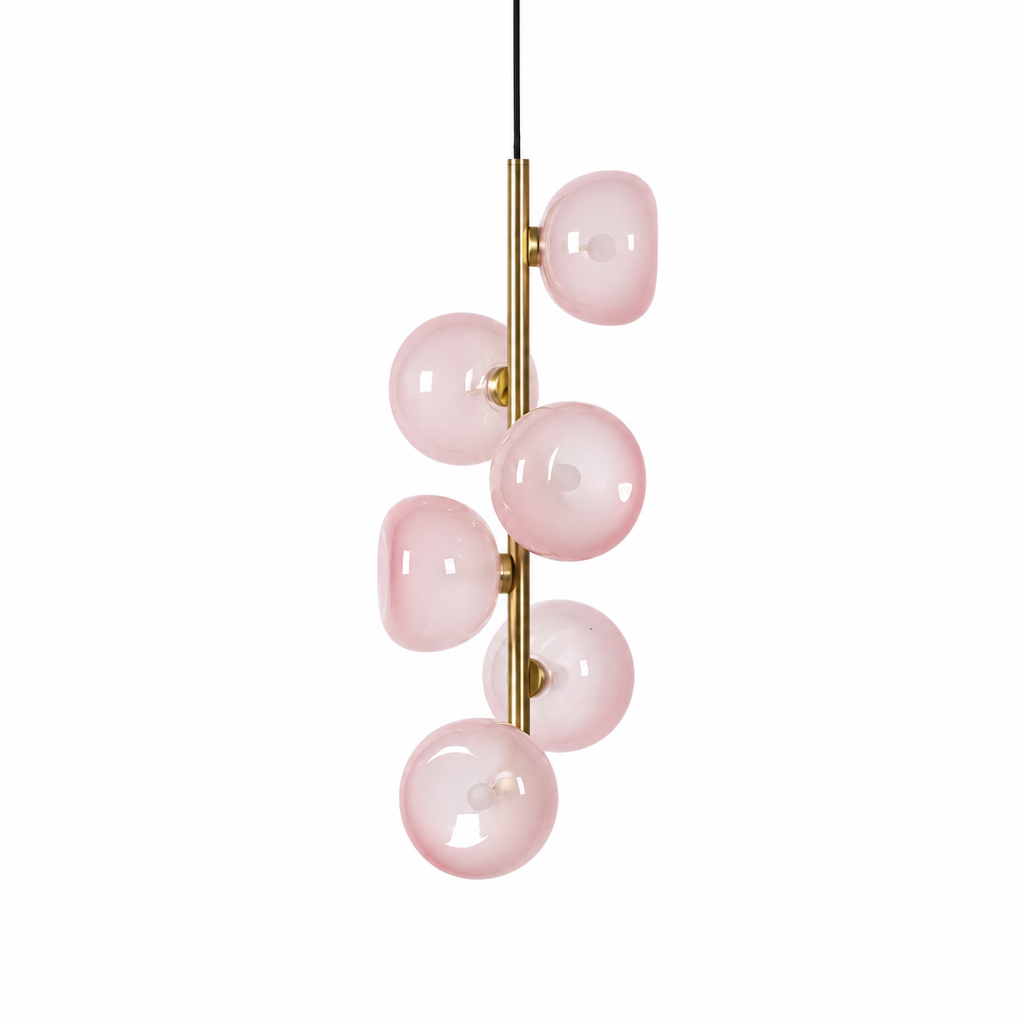 Blush glass six-light vertical pendant in Natural Brass on a white background