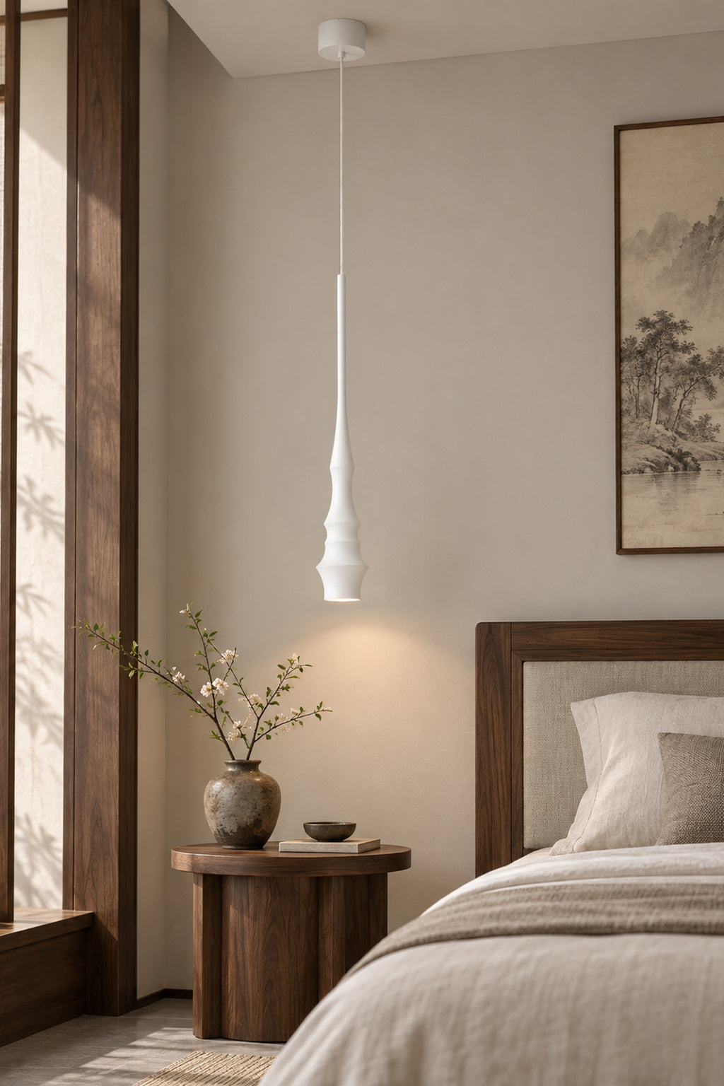 Torvelle Sculptural Pendant Light in white beside a contemporary bedroom · CDE 2026-09-25