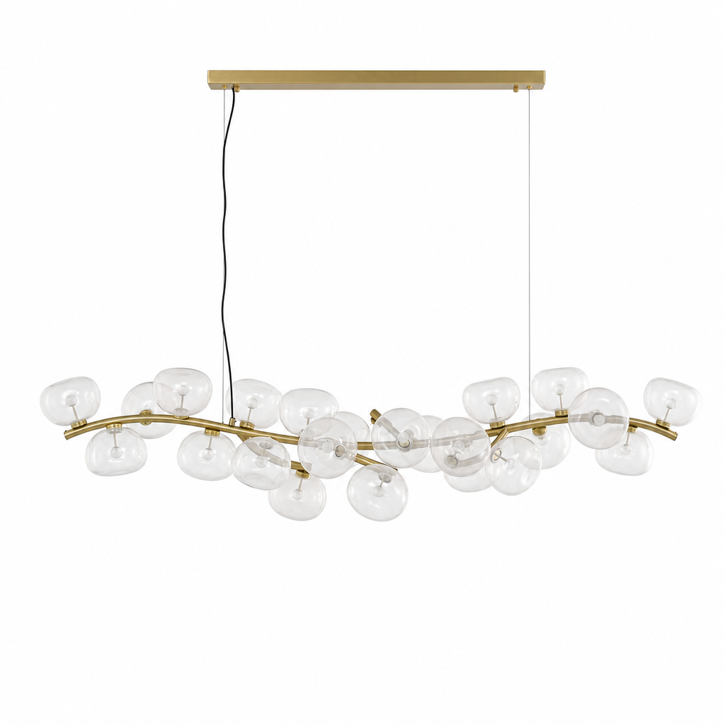 Clear glass 26-light linear chandelier in Natural Brass on a white background