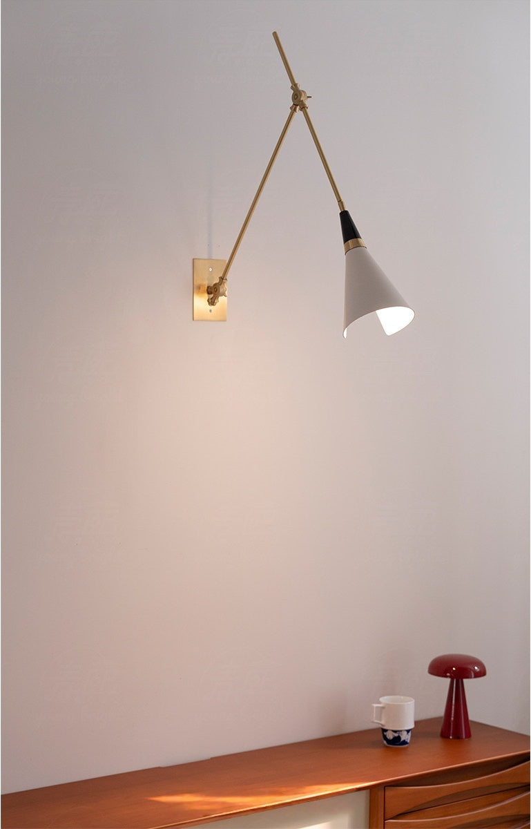 Adjustable Brass Wall Sconce — complete real illuminated Long Arm sconce above a console