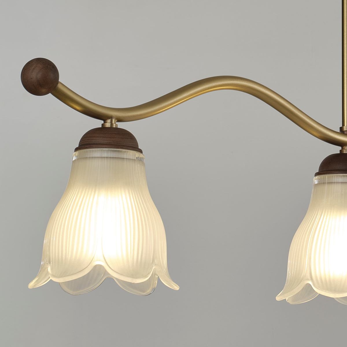 Cloveraine Linear Chandelier supplier real detail 4: Walnut-toned end finial, rail and shade assembly