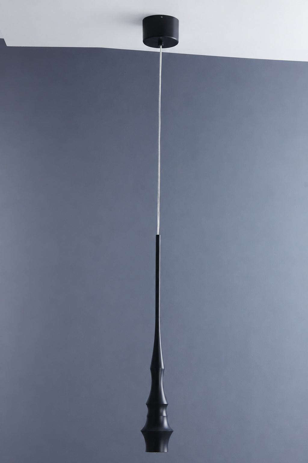 Torvelle Sculptural Pendant Light black finish installed real photo, light off · CDE 2026-09-25
