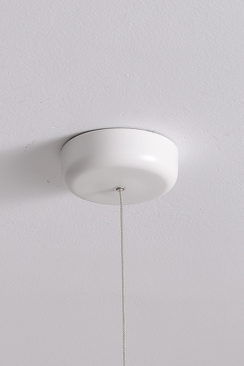 Velaire Sculptural Wing Pendant Light flush ceiling canopy and suspension detail