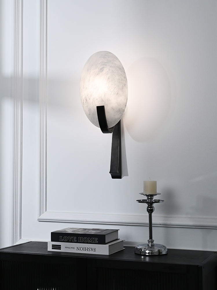 Modern Alabaster Oval Stem Wall Sconce above a console table