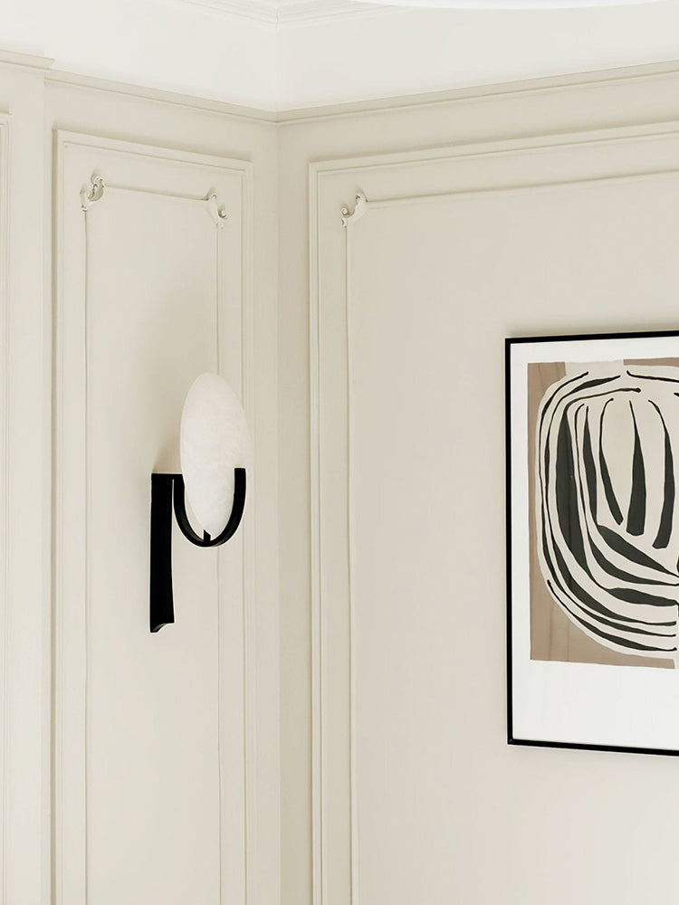 Modern Alabaster Oval Stem Wall Sconce in a hallway