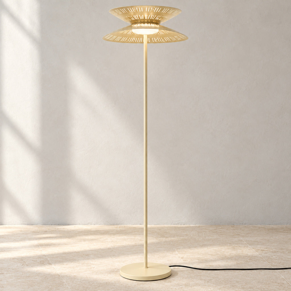 Cream Asterune perforated steel disc floor lamp in a contemporary interior