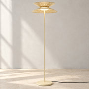 Cream Asterune perforated steel disc floor lamp in a contemporary interior