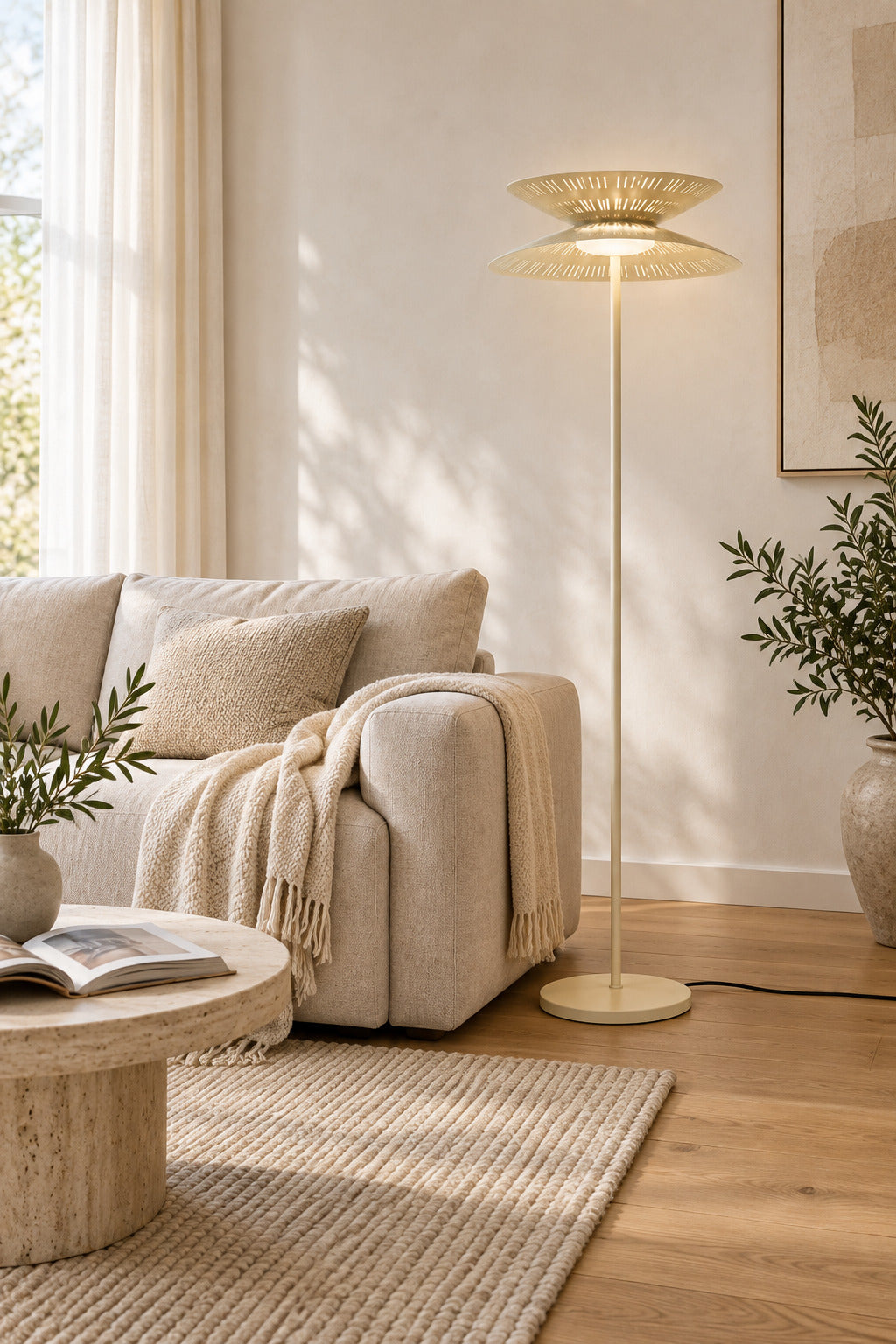 Cream Asterune floor lamp beside a modern sofa