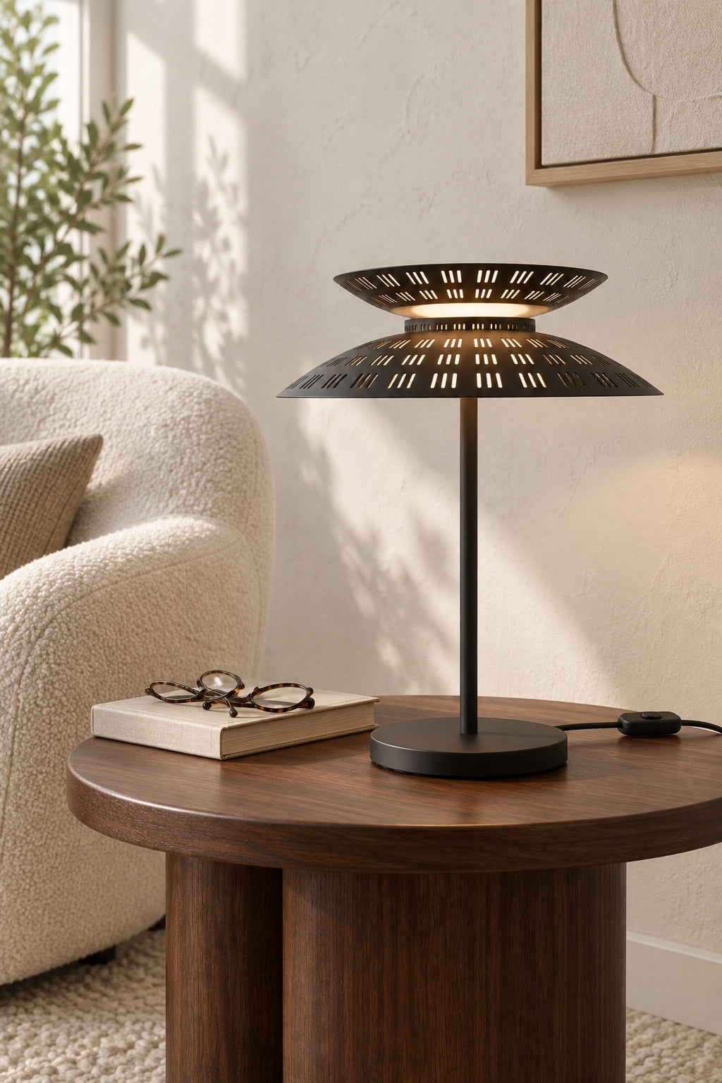 Black Coffee Asterune table lamp in a reading corner