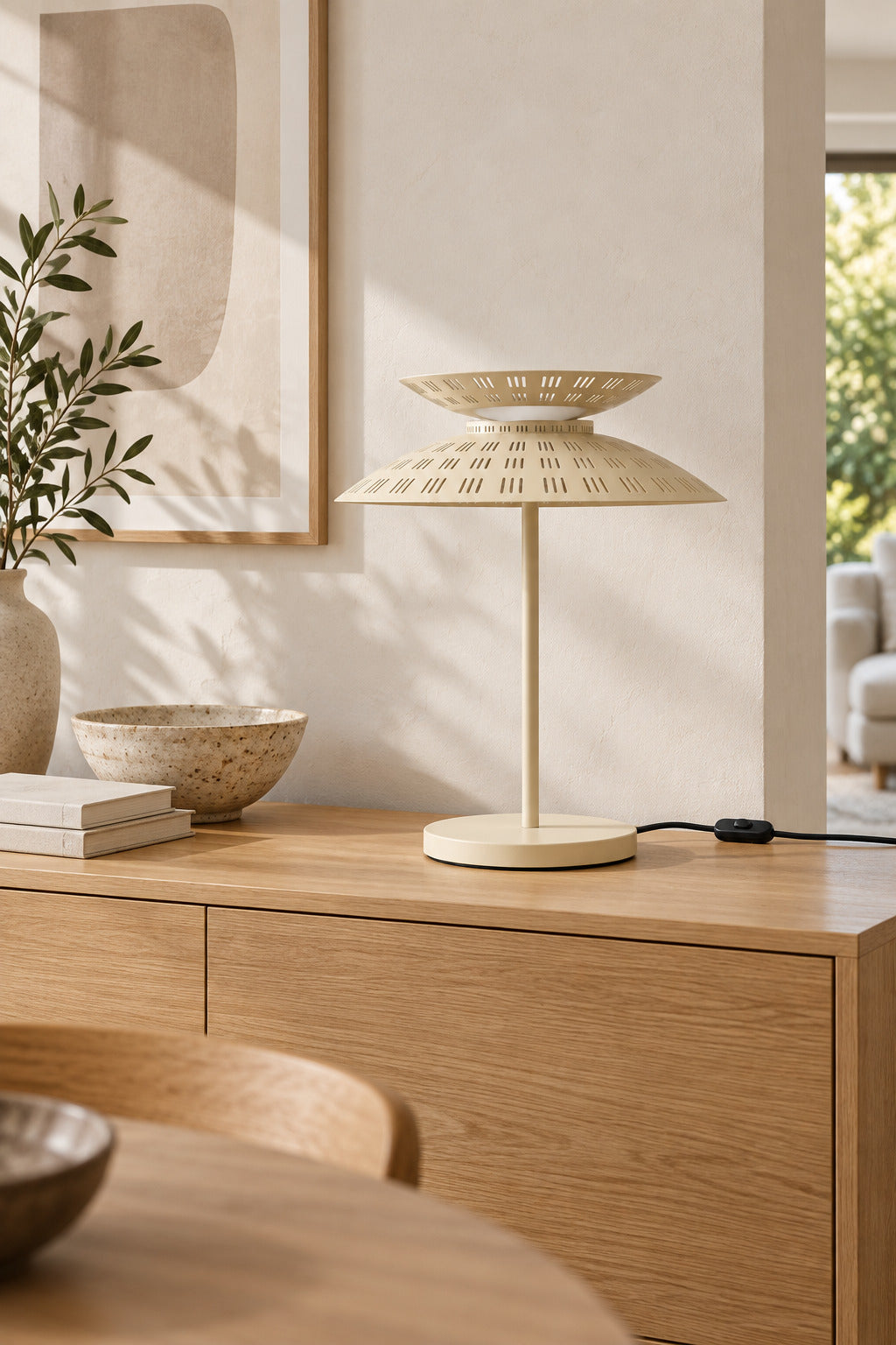 Cream Asterune table lamp on a sideboard, light off