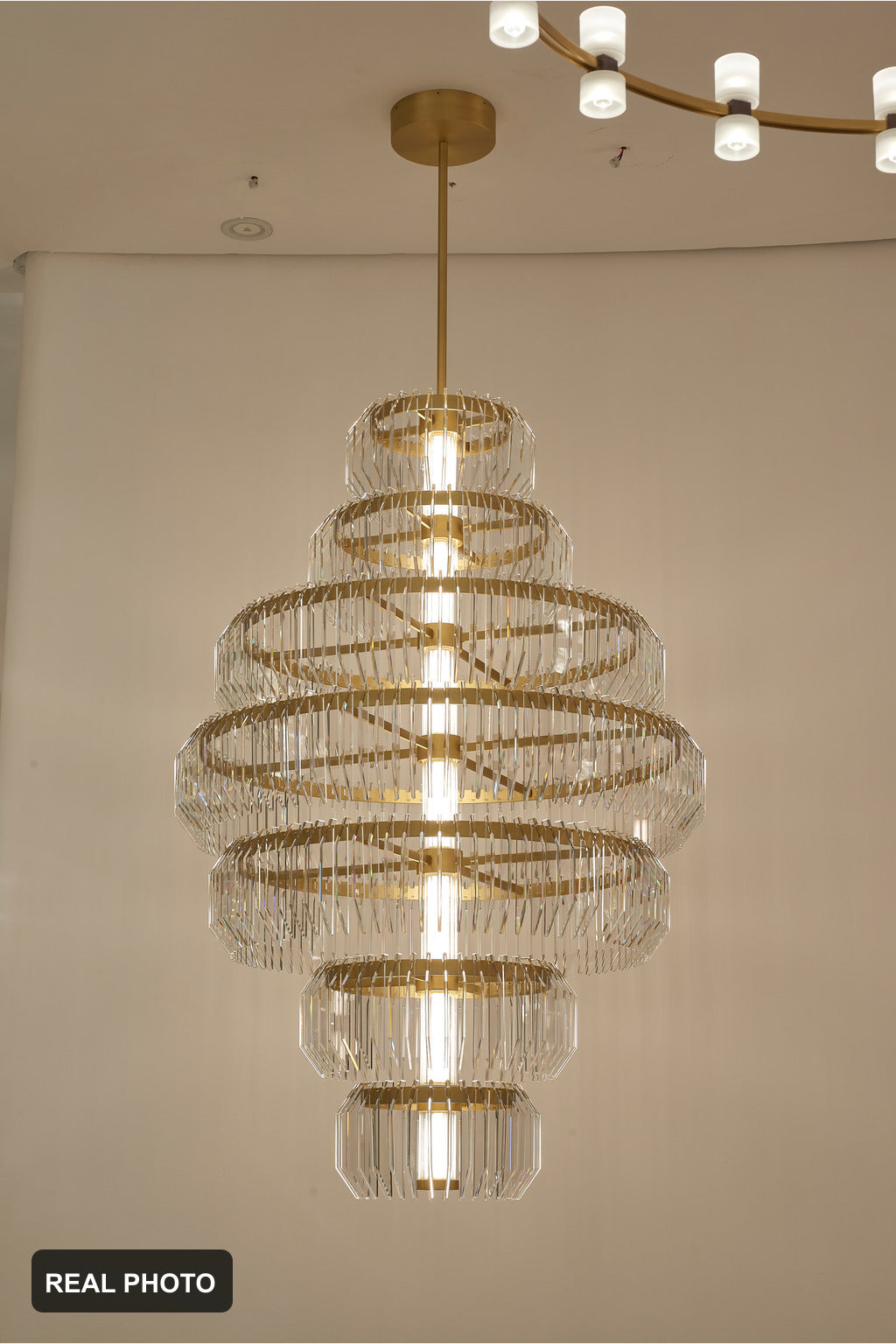 Arquelle Round Antique Brass Acrylic Tiered Chandelier real product photo 1 — REAL PHOTO · CDE English clean media 2026-09-23