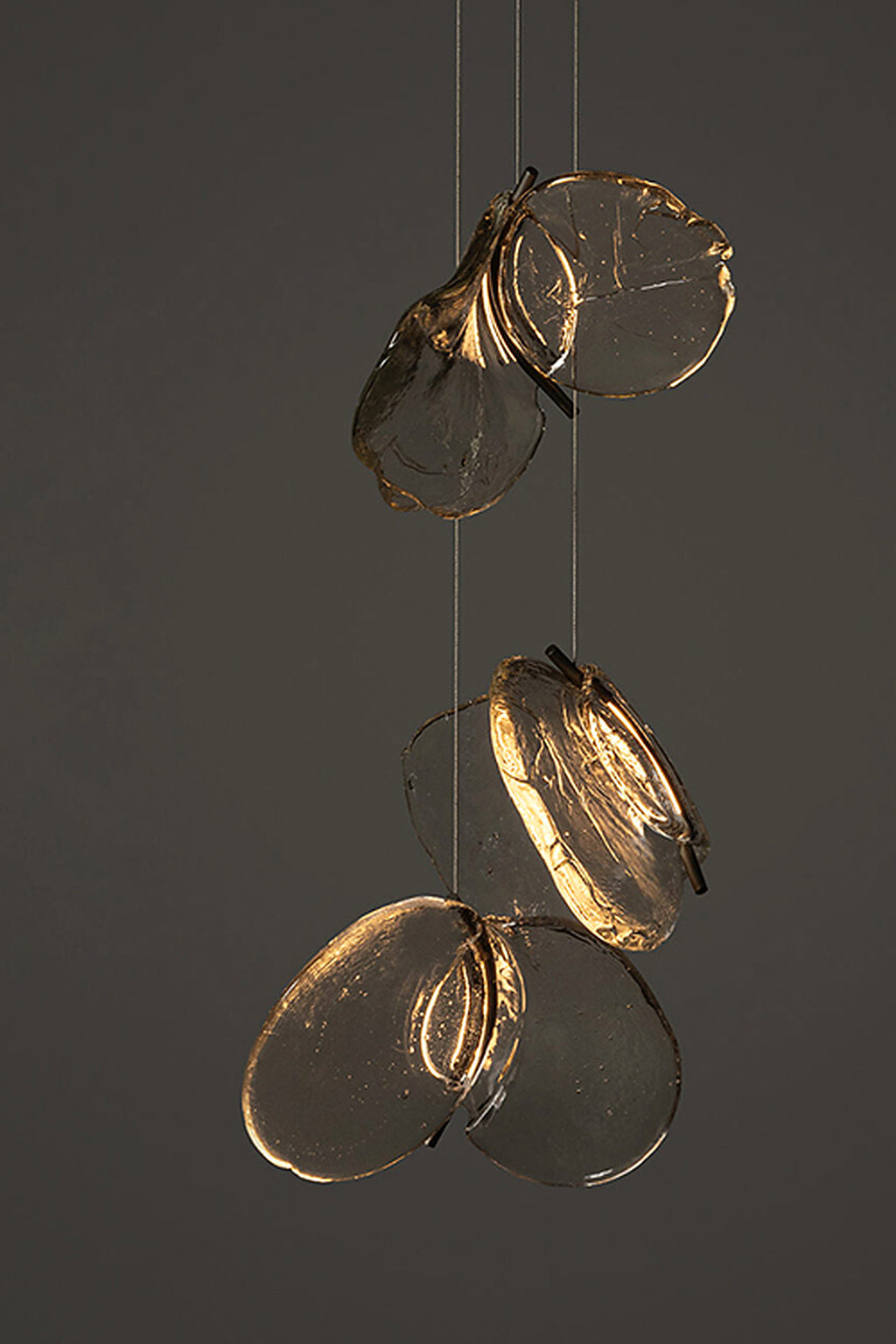 Small clear glass petal cascade chandelier, studio photograph