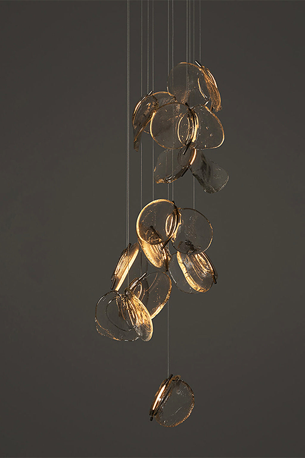 Tiered clear glass petal cascade chandelier, studio photograph