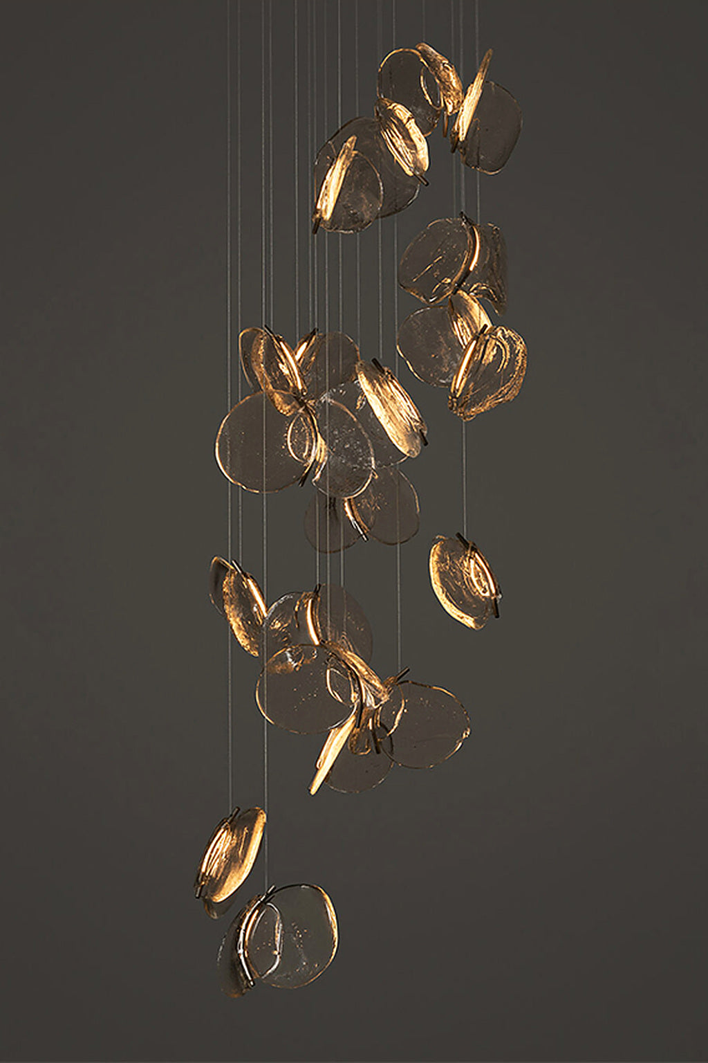 Large clear glass petal cascade chandelier, studio photograph