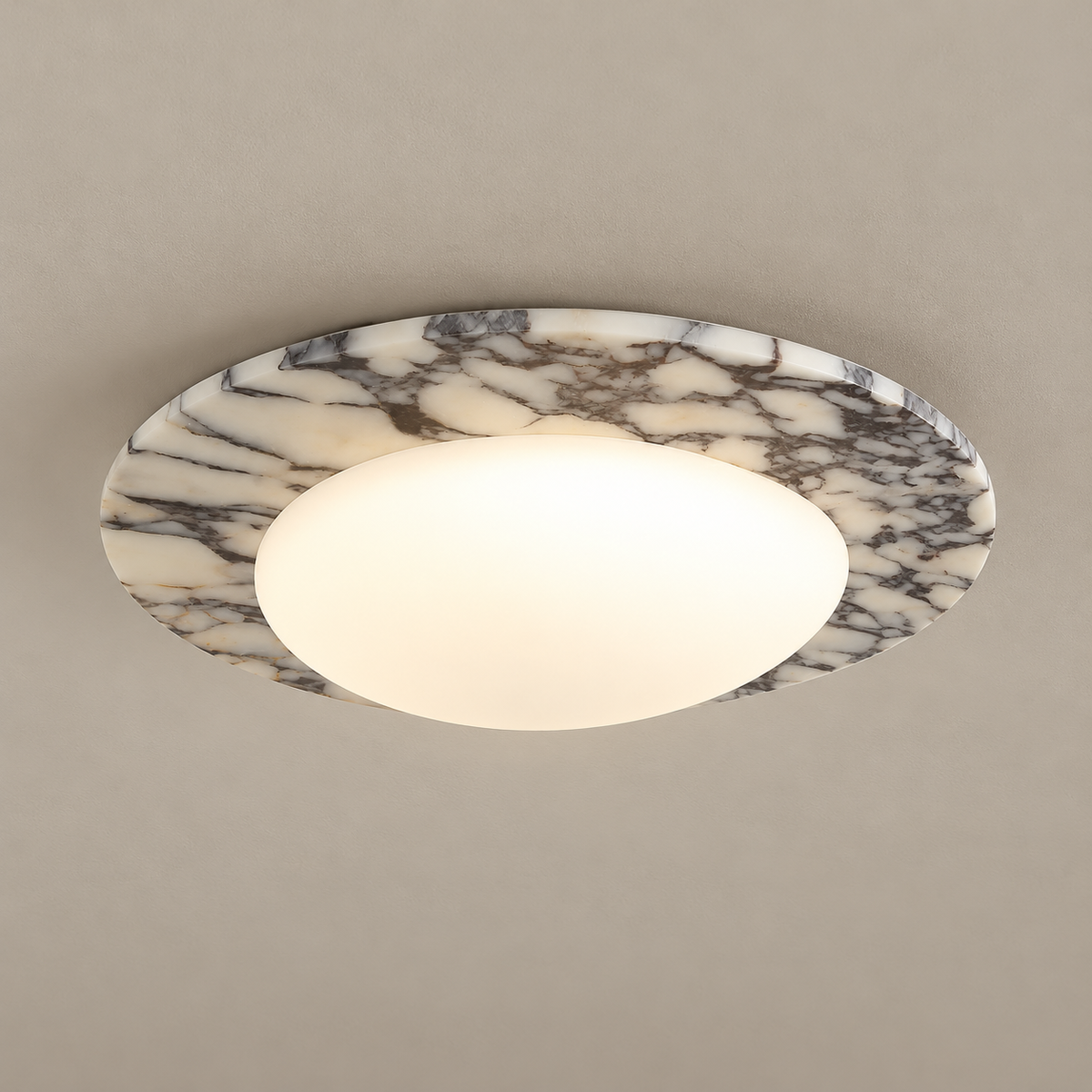 Emma Marble LED Ceiling Light on a warm greige background; Black and white marble, flush ceiling mount