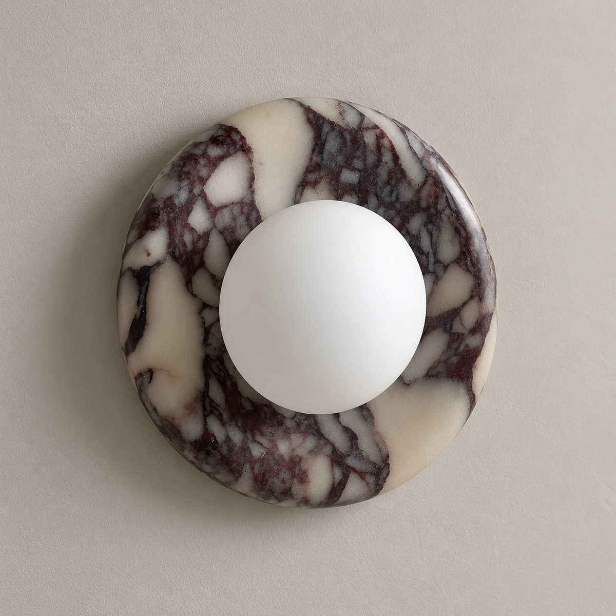 Orli Purple Marble Globe Wall Sconce on a warm greige background