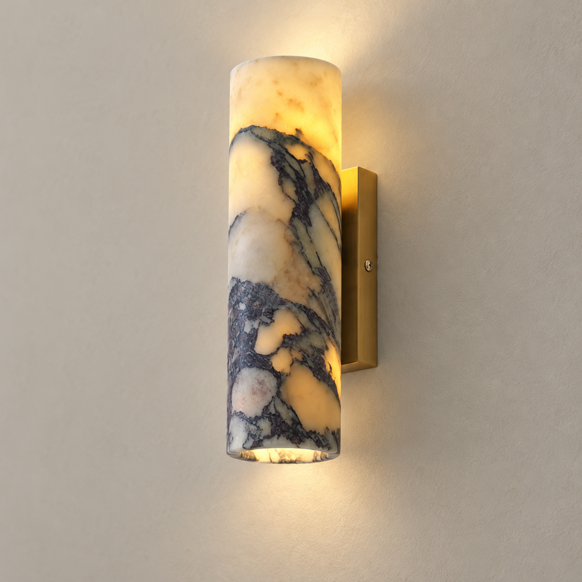 Purple Marble Cylinder Wall Sconce with Gold Backplate on a warm greige background; Purple veined marble cylinder with rectangular gold backplate