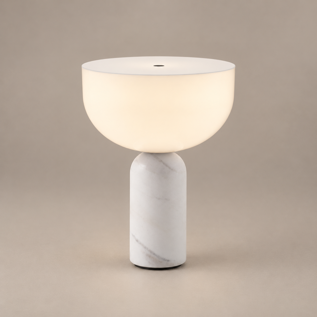 Kizu Marble Rechargeable Table Lamp on a warm greige background; White marble, portable rechargeable version
