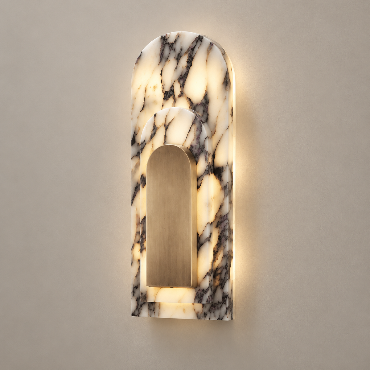 Archway Marble LED Wall Sconce on a warm greige background; White/purple-grey veined marble layered arch with brass front