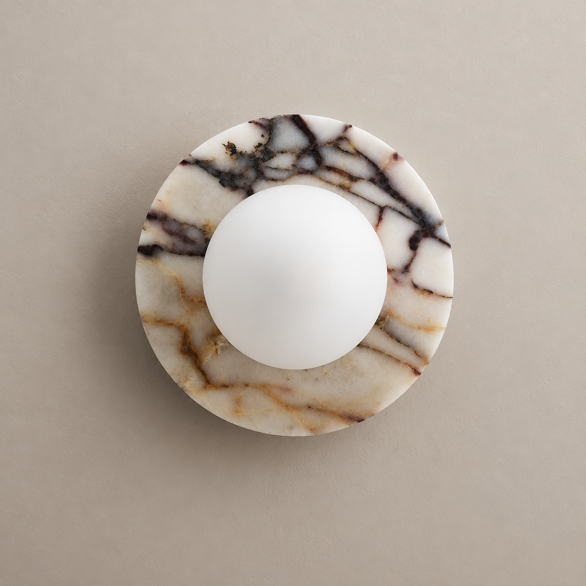 Lucie Flush-Mount Marble Wall Sconce on a warm greige background; White marble; wall mounted; opal globe off