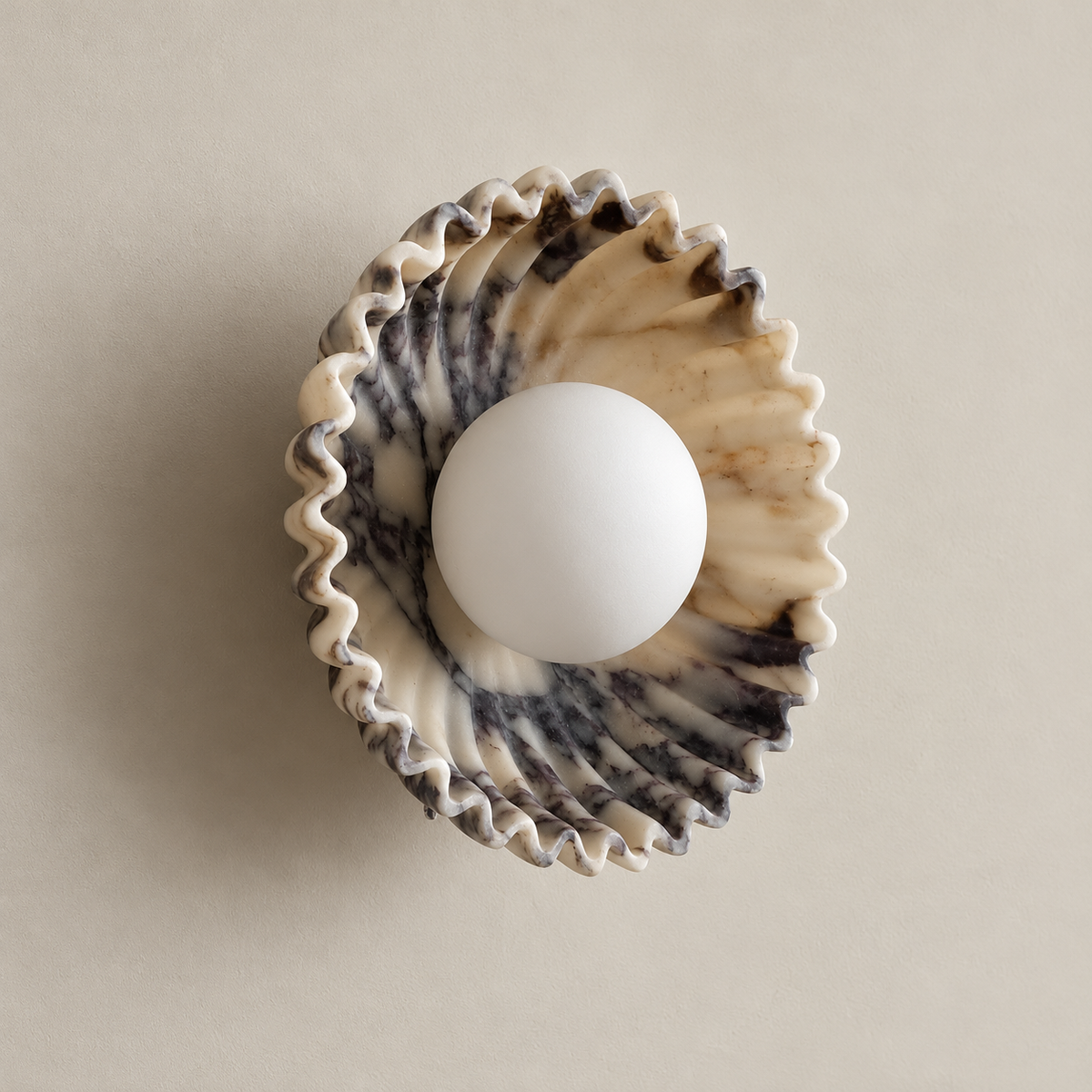 Ostro Art Deco Marble Small Wall Sconce on a warm greige background; Cream-purple marble spiral-fluted small sconce; opal globe off