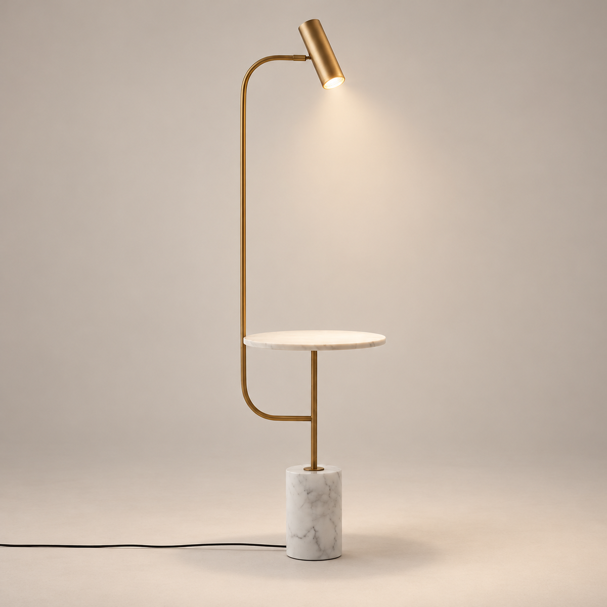 Tatum Metal Floor Lamp with Marble Base on a warm greige background; Brass reading floor lamp; white marble base and shelf