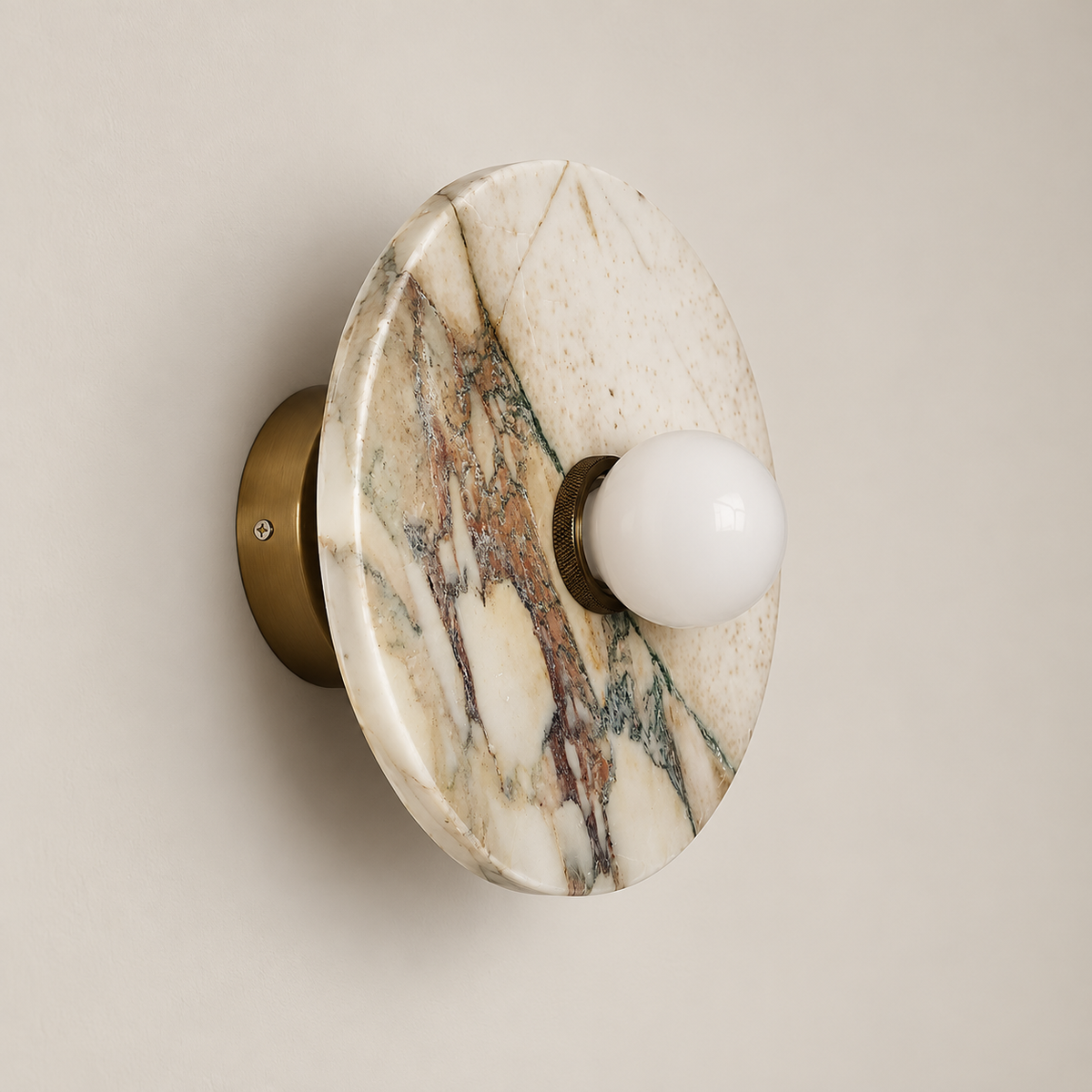 Alba Organic Modern Marble Wall Sconce on a warm greige background; Cream white pink purple marble disc with small white globe