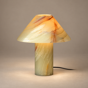 Pillar Stone LED Table Lamp on a warm greige background; Pillar cyan honey onyx all-stone table lamp
