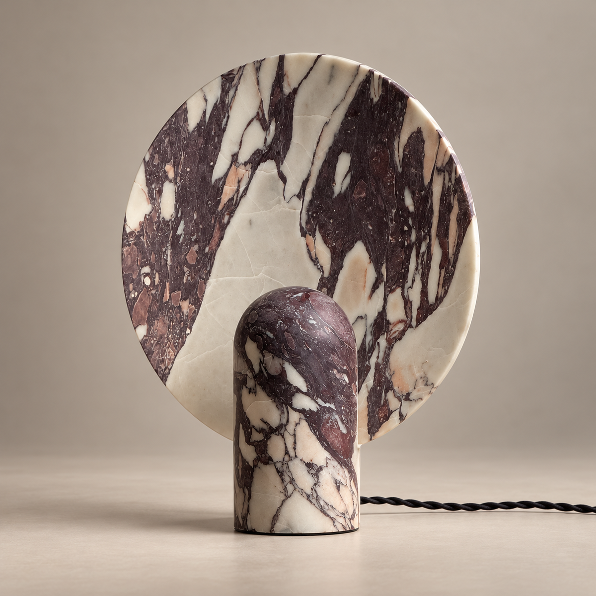 Fan Marble LED Table Lamp on a warm greige background; Fan purple marble upright disc table lamp