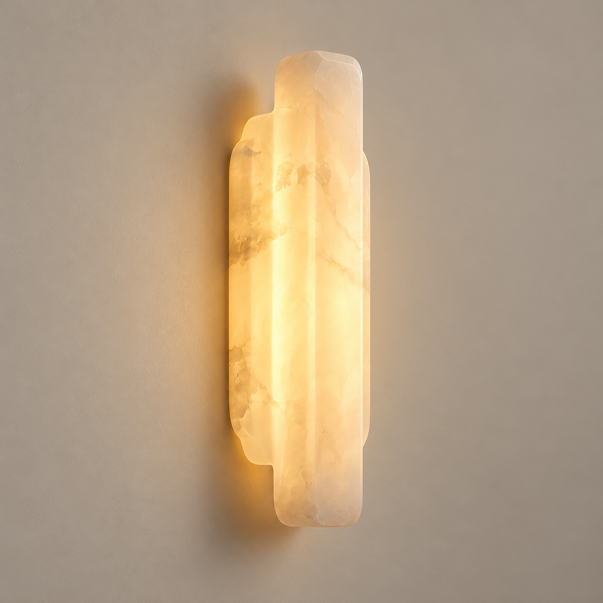 Jewel Onyx LED Wall Sconce on a warm greige background; White natural onyx warm LED