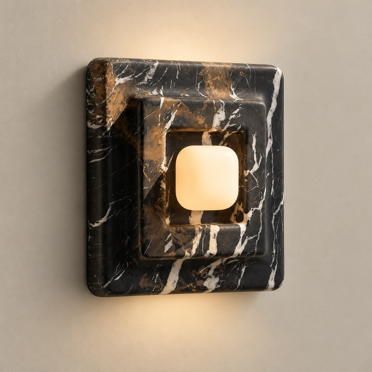 Franklin Minimalist Marble Wall Sconce on a warm greige background; Black white and amber marble square, on