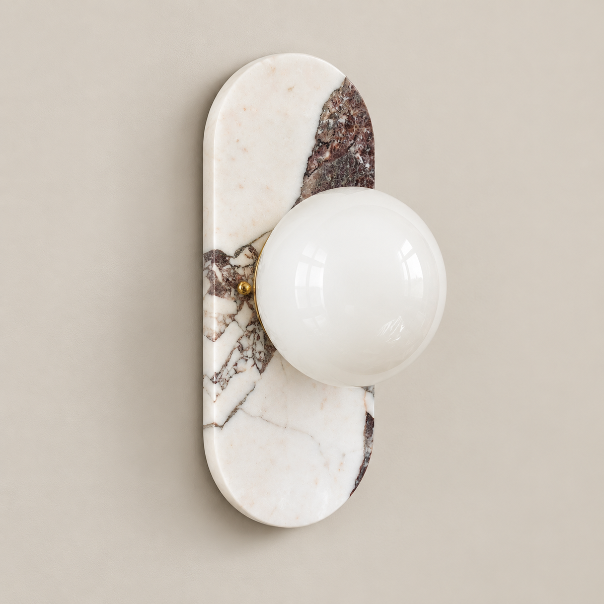 Viola Oval Marble Wall Sconce on a warm greige background; White purple breccia marble, glass globe off