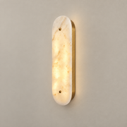 Fivorno Marble LED Wall Sconce on a warm greige background